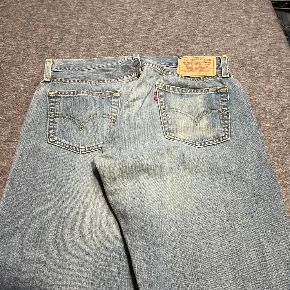 Levis 527 Low Boot Cut Jeans Mens 30x32 Light Wash Distressed Denim